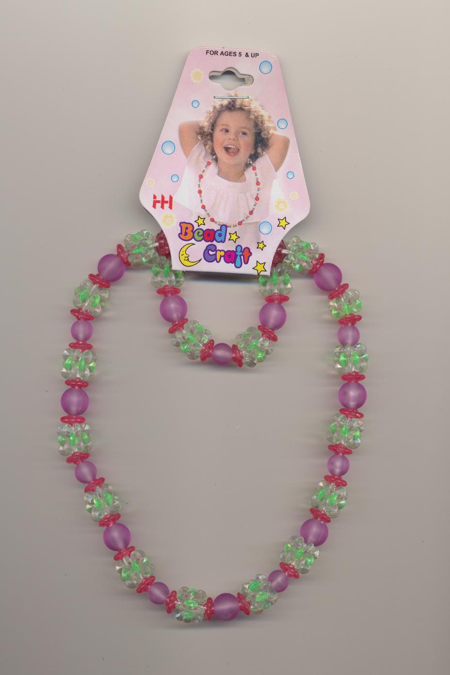 Childrens' set of plastic beads necklace and bracelet on elastic thread, made in China, ca.2000, length necklace 16'' 40cm., bracelet 8'' 20cm.